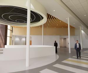 Rendering of the interior of a building with a staircase going down and a large circular element above it